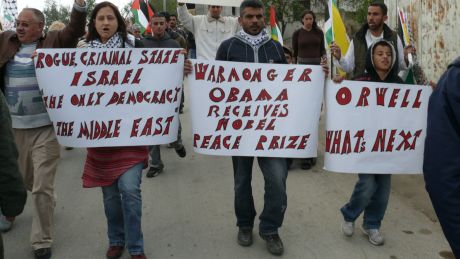 Eva Novkov (holding placard) doing her stuff in the Bil'in demonstration