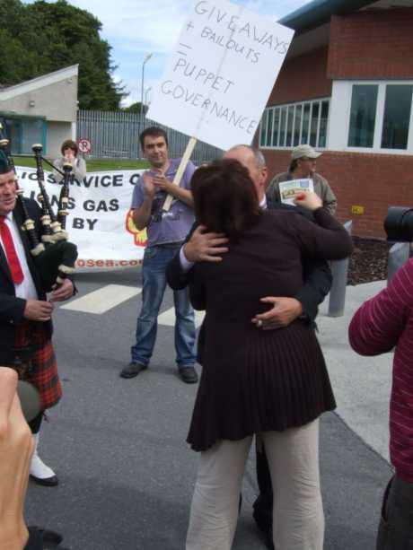 Pat being embraced by his wife Mary